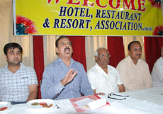 District president of the Bathinda Hotel, Restaurant & Resort Association, Satish Arora, interacts with the mediapersons in Bathinda on Saturday. 