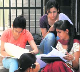 Students fill admission forms