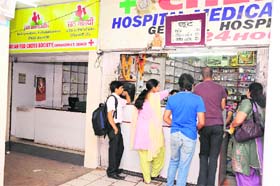 The Jan Aushdhi store wears a deserted look, while the adjacent chemist shop has a good stock of medicines and customers rush at the GMSH-16, Chandigarh