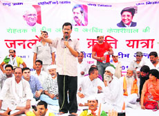 Team Anna member Arvind Kejriwal seeks public support for the war against corruption at a meeting in Rohtak on Sunday. 