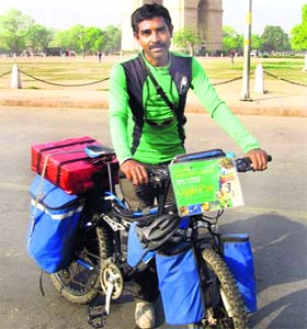 Ujjal Pal at the India Gate in New Delhi during his journey across India