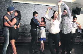 Youngsters perform salsa at a dance academy in Jalandhar