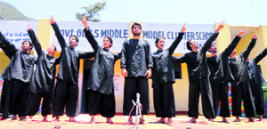 Members of theatre group Natrang in a scene from Balwant Thakurs play Choona Hai Aasman staged at Reasi on Sunday. 