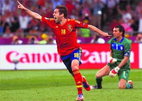Spains Jordi Alba celebrates after scoring the second goal during the final against Italy in Kiev on Sunday