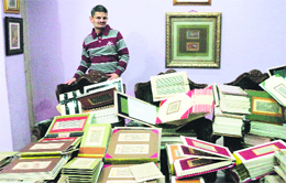 Rajnish Khosla with his mammoth collection of rare ancient manuscripts in Amritsar.