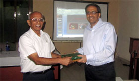Patron of the Bathinda Ophthalmological Society, Dr Ghanshyam, presenting a memento to Dr Rohit Omprakash, on Doctors Day.