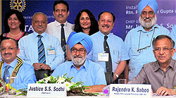 Justice SS Sodhi, former Chief Justice of the Allahabad High Court and president of The Tribune Trust (centre), at the installation of the new Rotary Club president Vivek Gupta (left) at the PHD Chamber of Commerce, Sector 31, Chandigarh, on Monday. Also seen are former Rotary International president Rajendra K Saboo and new team members