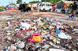 With no garbage collection system in place, filth is littered in the surroundings of a residential area of Colony Number 4.