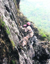 ITBP jawans displaying their talent during the Second Inter-Frontier Rock Climbing Competition held in Mussoorie on Monday.