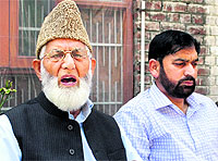 Chairman of the hardline faction of the Hurriyat Conference Syed Ali Shah Geelani addresses a press conference in Srinagar on Monday