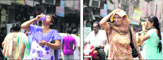 A woman drinks sweetened water at a chhabeel at a market in Jalandhar on Monday; and (right) a woman covers her head with a handkerchief to beat the heat in Jalandhar on Monday. 