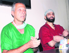 Dr Sushil K Sharma, HoD, Cardiology, GMC, Jammu, with Mark Silvestri (left) on a day-long workshop on cardiology in Jammu on Monday. 
