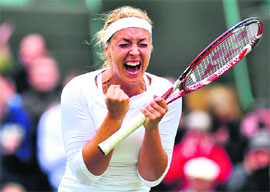 Sabine Lisicki celebrates after beating Maria Sharapova.