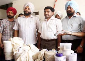 State Special Operation Cell officials show the contraband seized from the trio in Amritsar