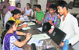 Students submit forms at the Government Model Senior Secondary School, Sector 23, in Chandigarh on Tuesday.