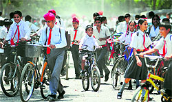 Students return to their homes after attending school in Ludhiana