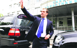 Russias Prime Minister Dmitry Medvedev waves to local residents in Yuzhno-Sakhalinsk, the capital city of the Pacific Island of Sakhalin, on Tuesday.  AFP