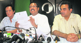 BJP leader Satya Pal Jain (centre) addresses a press conference at the Press Club in Chandigarh on Wednesday. 