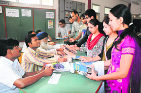 Students buy prospectus at GGDSD College, Sector 32, in Chandigarh on Wednesday.