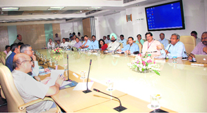 Chief Secretary Alok Kumar Jain (extreme right) during a meeting at Yojna Bhavan in New Delhi.