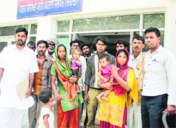 Brick-kiln laboures come out of the SSP (Rural) office after submitting a complaint in Jalandhar on Wednesday. Photo: Sarabjit Singh 