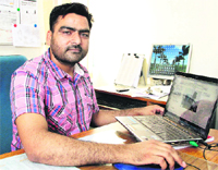 Prof Lakhwinder Pal Singh of the Dr BR Ambedkar National Institute of Technology shows his working posture software. Photo: Sarabjit Singh