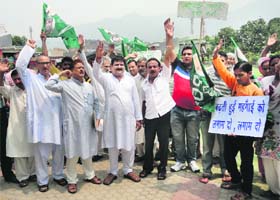 PDP activists at a protest rally in Reasi on Wednesday