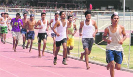 Candidates participate in 1,600m race during the Army recruitment drive in Ludhiana on Wednesday.