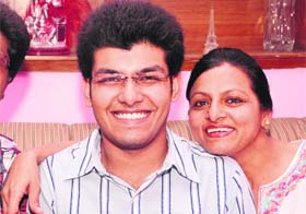 Tartik Thami with his mother