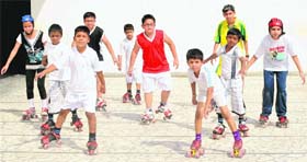 Children at a skating summer coaching camp in Play Way Senior Secondary School, Patiala