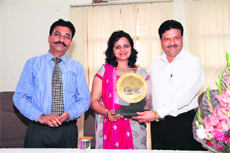 Anita Kumari Gangwar, a former student of Law College and now a Civil Judge (junior division), being felicited by her alma mater in Dehradun on Thursday. 