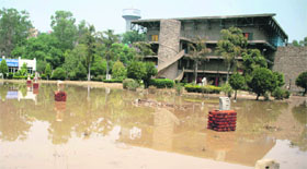 Rainwater inundated the Jammu and Kashmir Academy of Art Culture and Languages on Thursday.