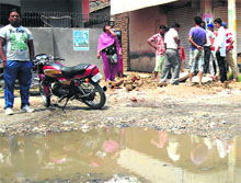 Sewage accumulates on a road