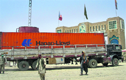 A truck carrying supplies for NATO troops crosses over from Pakistan into Afghanistan on Thursday.  Reuters