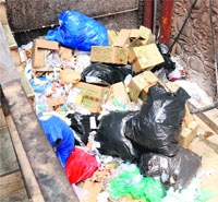Medical waste lies beside the stairs behind the emergency at the PGI in Chandigarh on Friday. 
