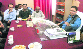 MC president OP Uniyal discusses issues related to Landour Bazaar with residents of the area in Mussoorie on Friday