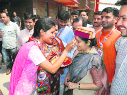 Leader of the Opposition in the Lok Sabha Sushma Swaraj being greeted at Kangra on Friday. 