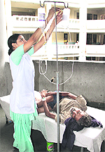 Manjit Singh, an abandoned man, gets treatment at the Civil Hospital in Jalandhar on Friday. 