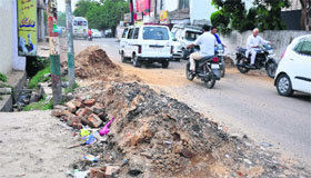 A view of a dug-up road in Gandhi Nagar, Jammu.