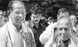 UPA Presidential candidate Pranab Mukherjee with Assam Chief Minister Tarun Gogoi at the airport in Guwahati on Friday. Pranab also met Meghalaya CM Mukul Sangma, Arunachal CM Nabam Tuki, leaders of the All-Indian United Democratic Front led by Badruddin Ajmol and Congress ally in Assam Bodoland Peoples Front. 