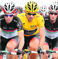 Overall leader Switzerland's Fabian Cancellara (yellow jersey) rides in the sixth stage of the Tour de France in Metz, France, on Friday. Slovakia's Peter Sagan won the sixth stage on Friday. Germany's Andre Greipel was second and Australia's Matthew Goss was third. 