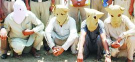 Four highway robbers, who used to snatch vehicles after killing taxi drivers, in the police custody on Saturday.