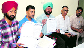 Representatives of several NGOs address mediapersons in Amritsar on Saturday.