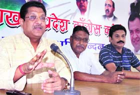 Congress Vice-President Suryakant Dhasmana (extreme left) addresses a press conference at Congress Bhavan in Dehradun on Saturday