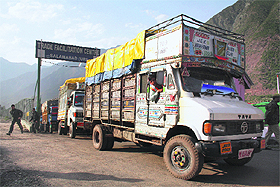 Trucks cross the Salamabad post on the LoC.