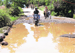 A potholed stretch on the Surankote-Bafliaz road.