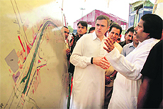 Chief Minister Omar Abdullah being briefed on the Bikram Chowk-Satwari flyover project in Jammu on Saturday.