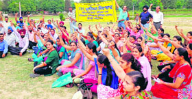 Unemployed teachers raise slogans against the SAD-BJP government in Amritsar on Sunday.