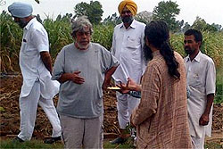 Filmmaker Saeed Akhtar Mirza interacts with organic farmers in Chaina village of Faridkot district on Sunday