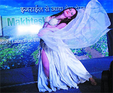 A belly dancer performs at the pesticides dealers meet in Bathinda on Sunday.